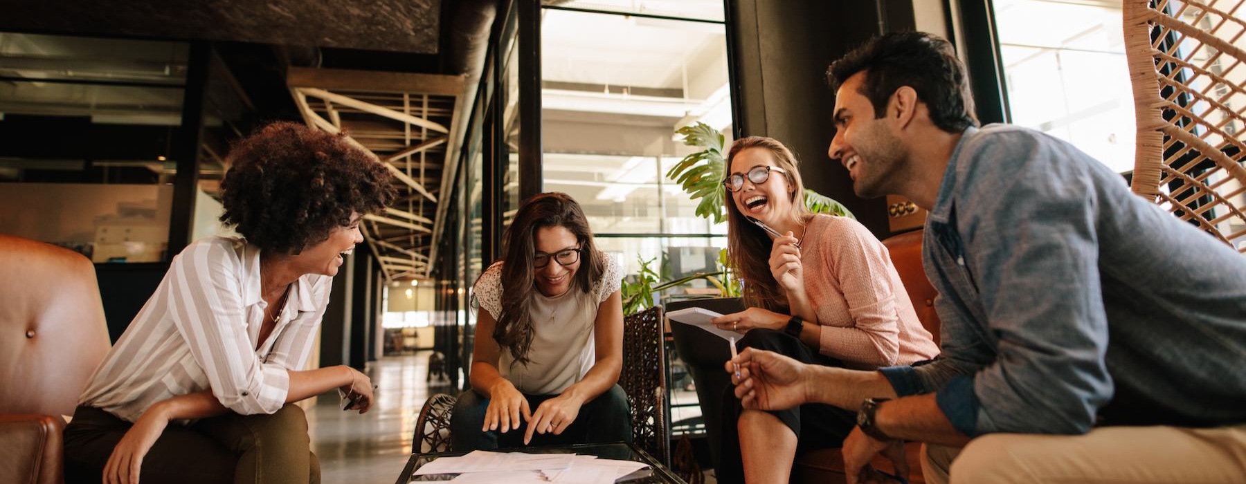 people laughing while working