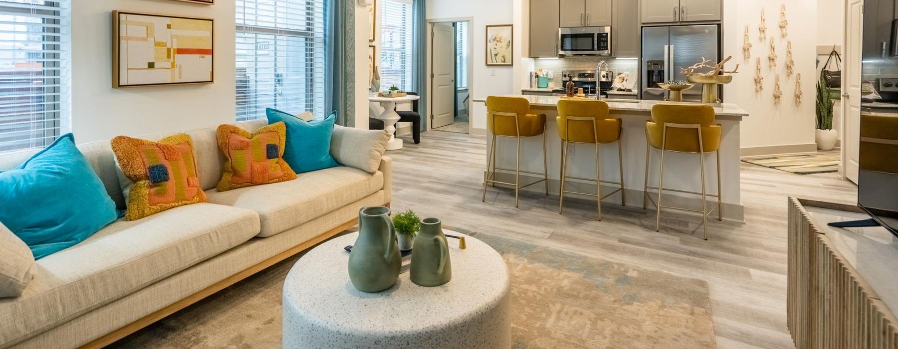 a living room with a couch and a table