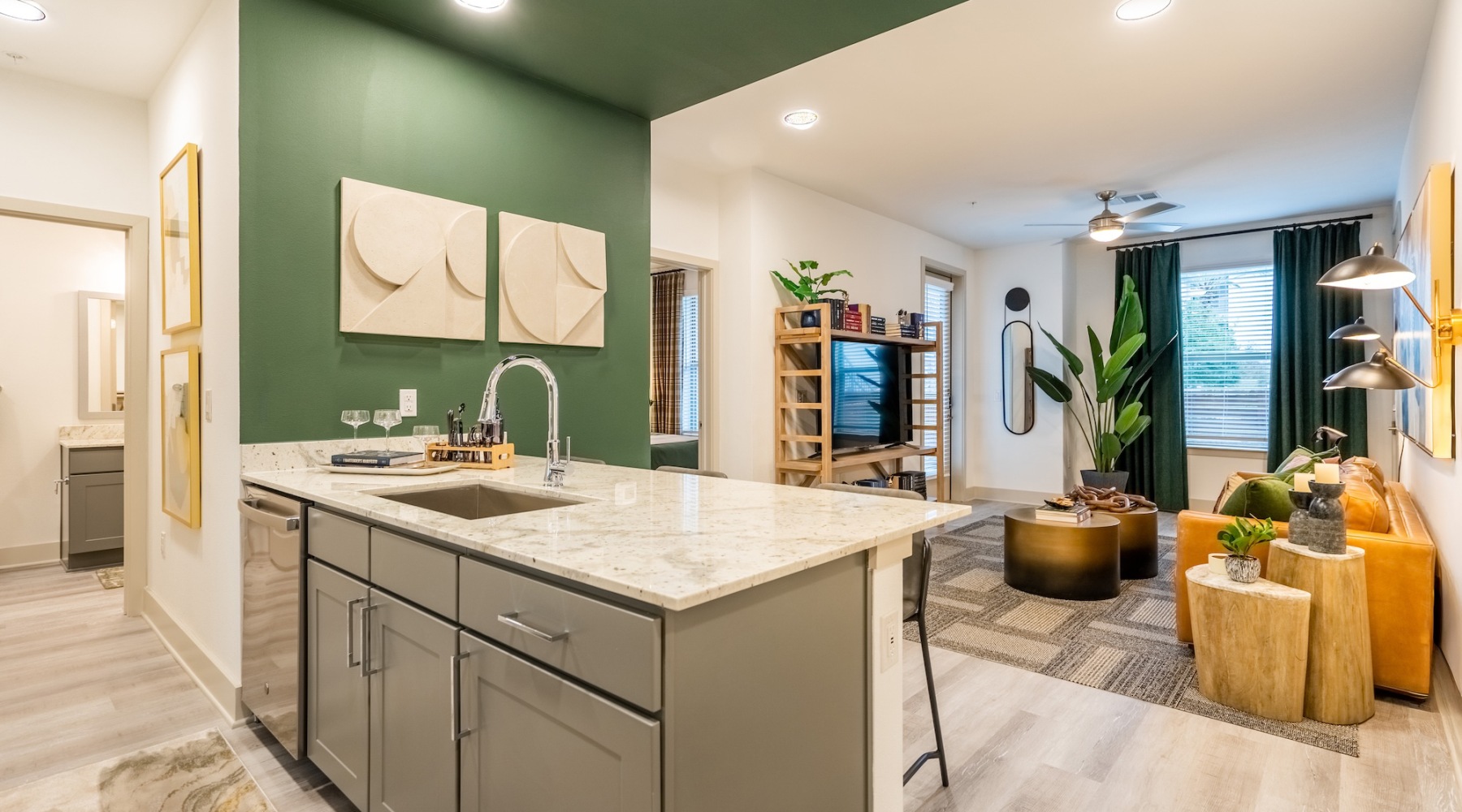 a kitchen and living room area