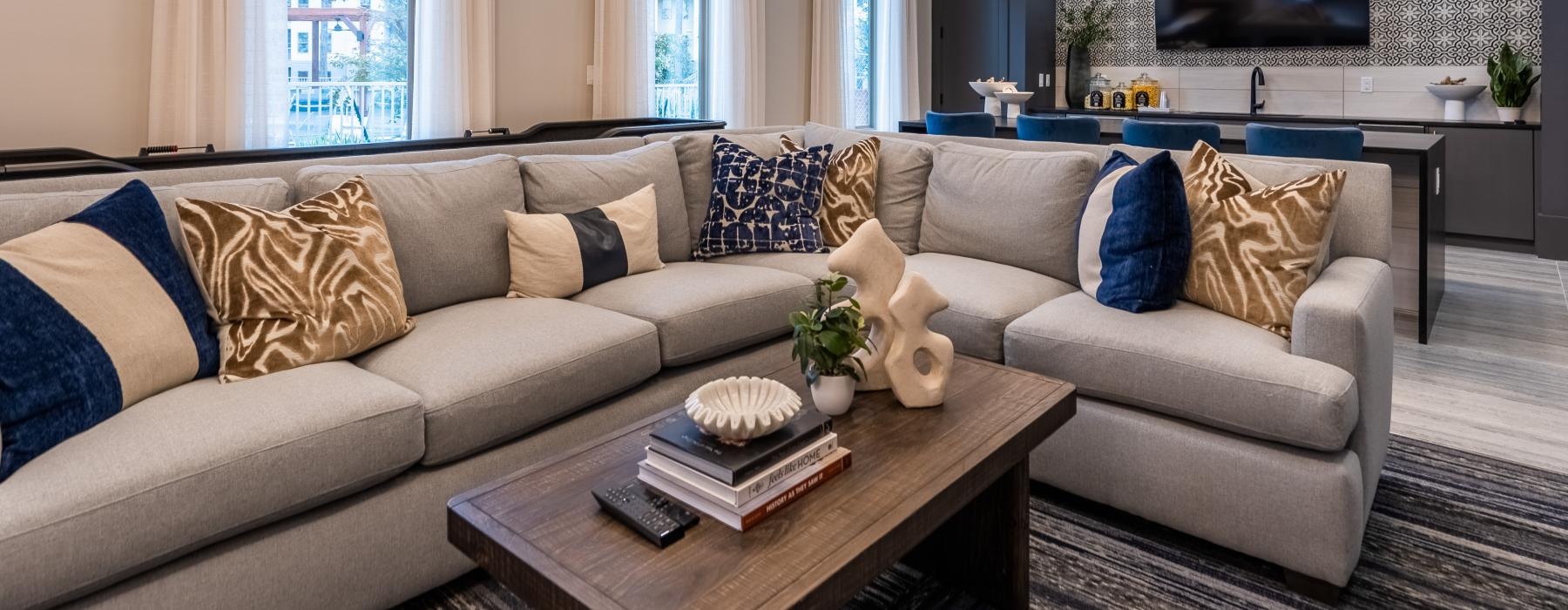 clubroom with a large tv and a couch